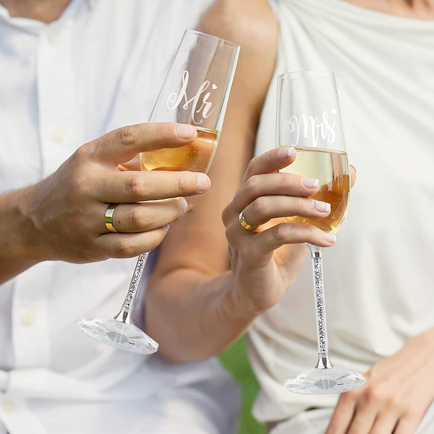 https://varlka.com/cdn/shop/products/wedding-cake-knife-and-server-set-crystal-champagne-flutes-glasses-engraved-mr-mrs-cake-cutting-set-for-wedding-bride-and-groom-toasting-champagne-flutes-annive-392576.jpg?v=1699263662
